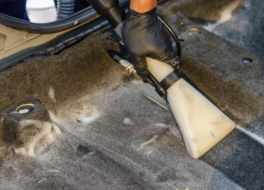 Shampoing des tapis à l'extracteur